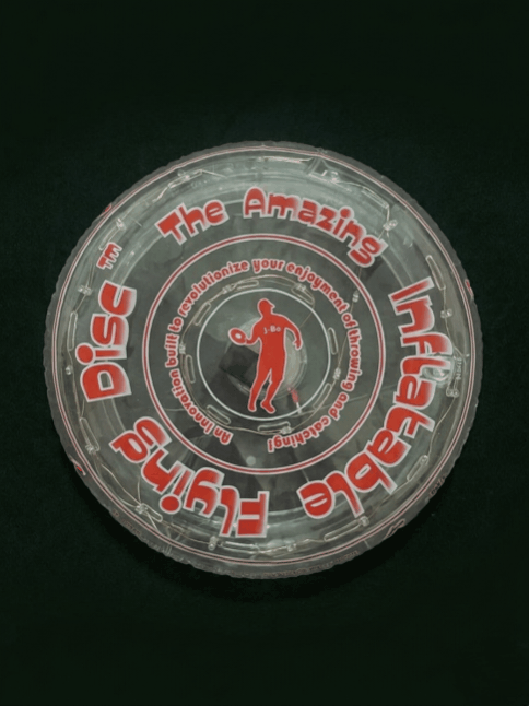 Light show demonstration of 12-inch multicolor LED flying disc with red and white printing