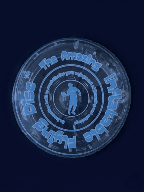 Light show demonstration of 12-inch warm white LED flying disc with blue and white printing