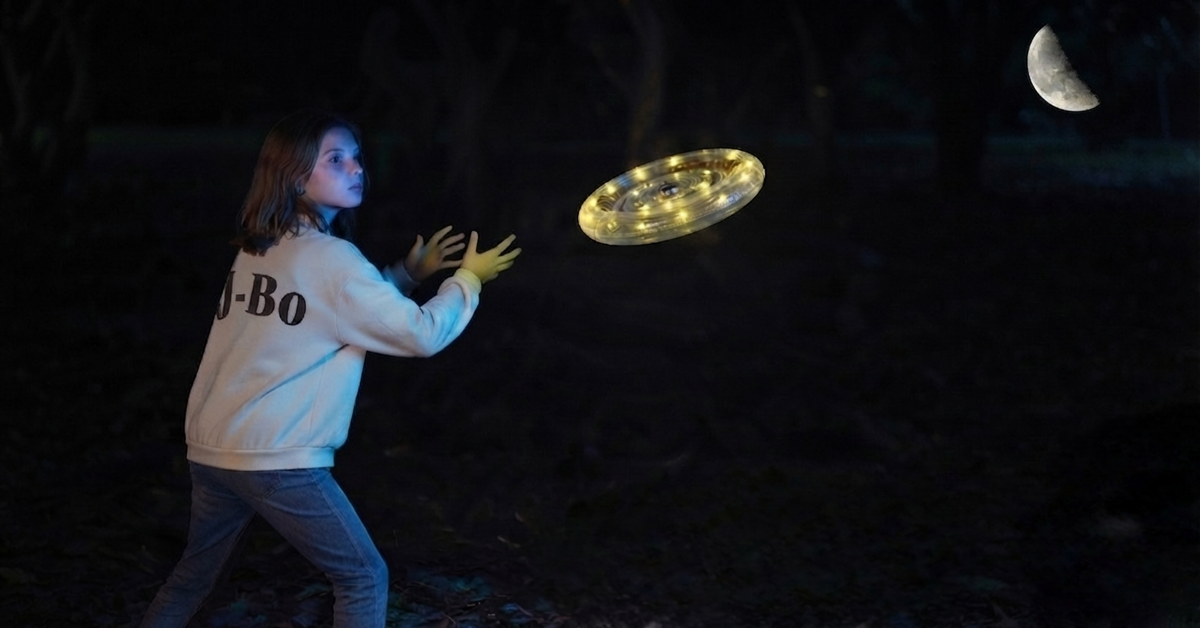 Moonlit Drift - 12-inch warm white LED flying disc designed for night play and quiet evenings